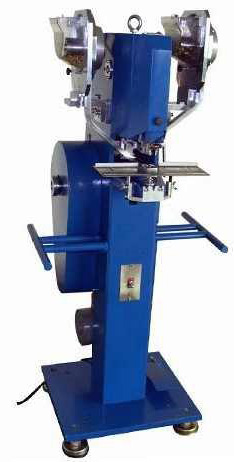 Rome's snap fastener machine